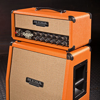 Recto-Verb Head with 1x12 Slant Mini Rectifier Extension Cab in Orange Vinyl, Cream and Tan Grille and Black Piping and Corners.